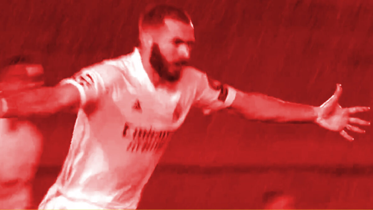 Karim Benzema celebrates after scoring a goal against Chelsea