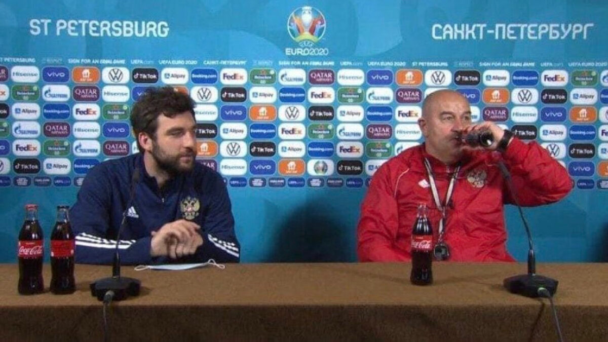 Russia manager Stanislav Cherchesov drinks Coke Zero during a press conference