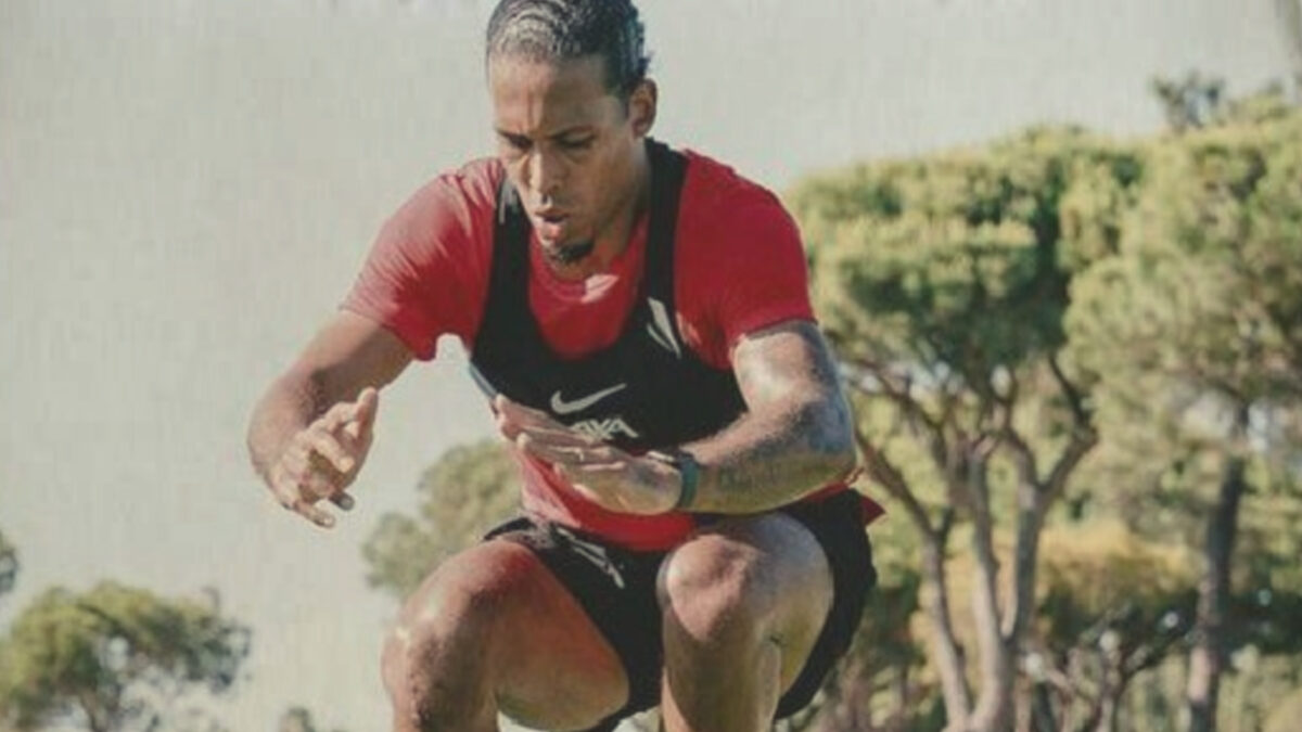 Virgil van Dijk doing a high jump in training