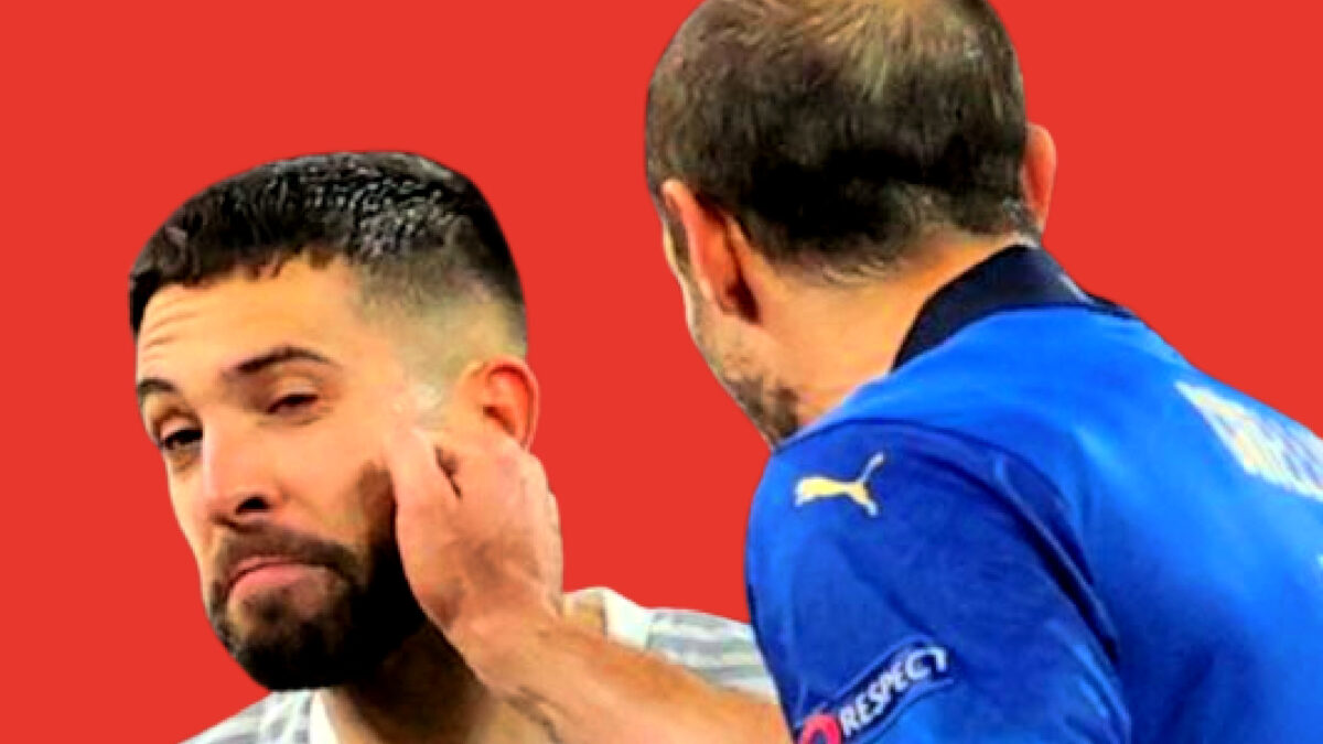 Giorgio Chiellini playfully punching Jordi Alba in the face