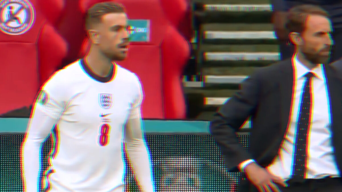 Jordan Henderson and Gareth Southgate watch England score their second goal against Germany from the sidelines