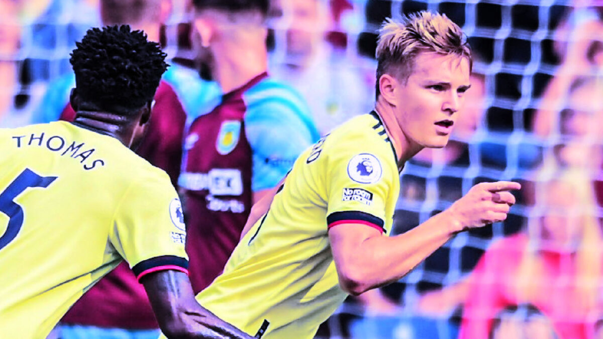 Martin Odegaard celebrates after scoring a pinpoint freekick against Burnley