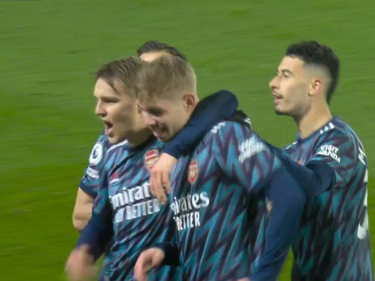 Arsenal players celebrate their 4th goal against Leeds United