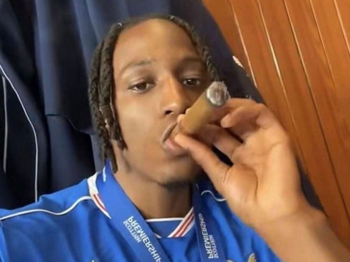 Photo of Joe Aribo smoking a cigar