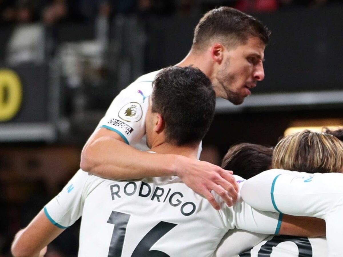 Ruben Dias celebrating with Man City players