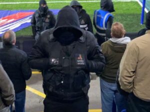 balaclava wearing stewards at AFC Wimbledon