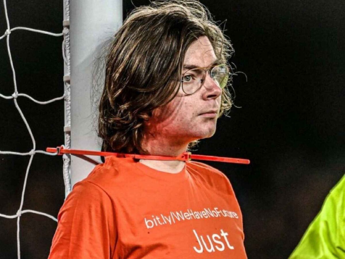 21-year-old Louis Mckechnie , a supporter of Just Stop Oil' group cable-tied himself to the goalpost at Goodison Park during Everton v NUFC.