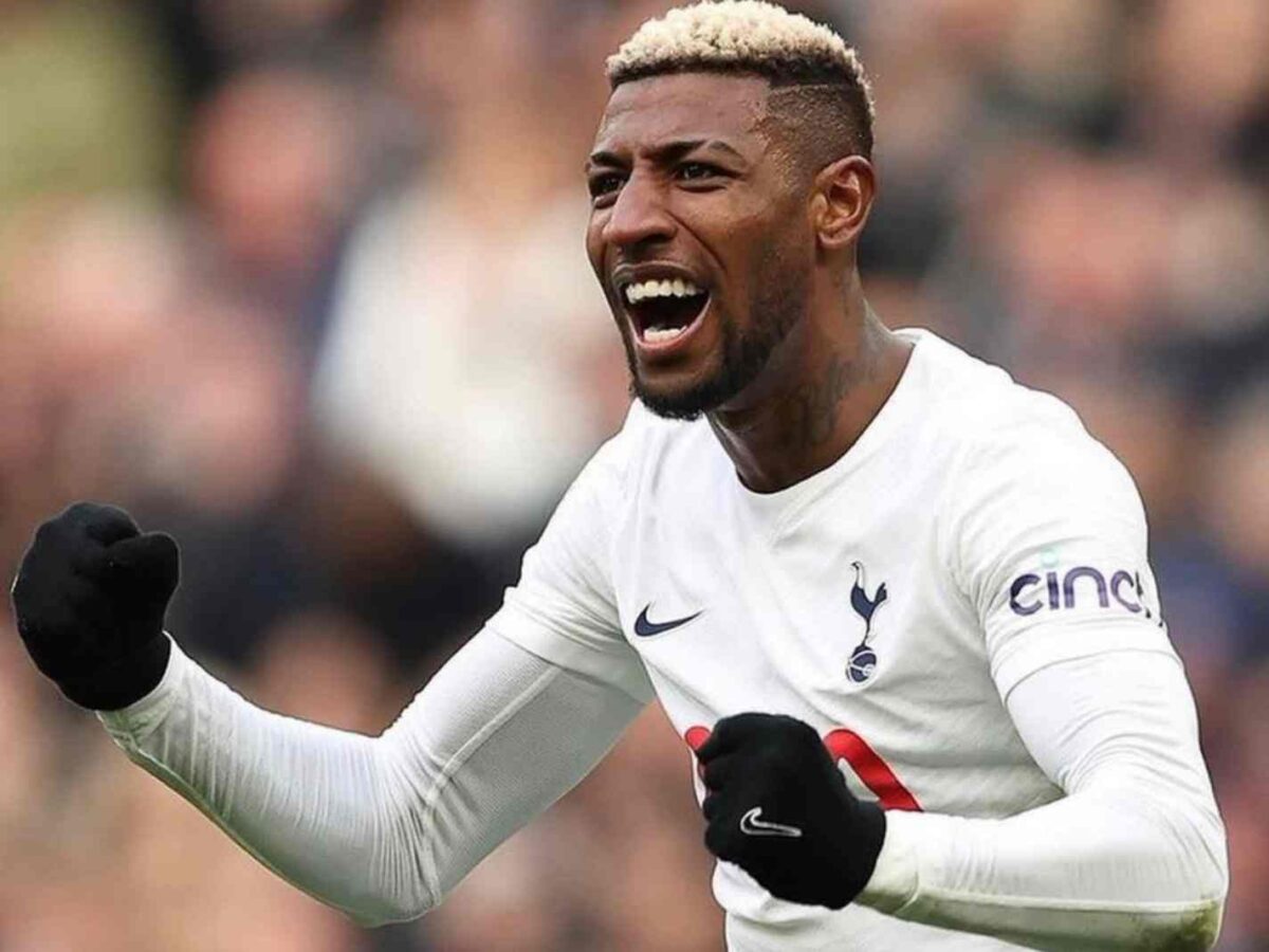 The image shows Emerson Royal pumping his fists in the air during a Tottenham match.