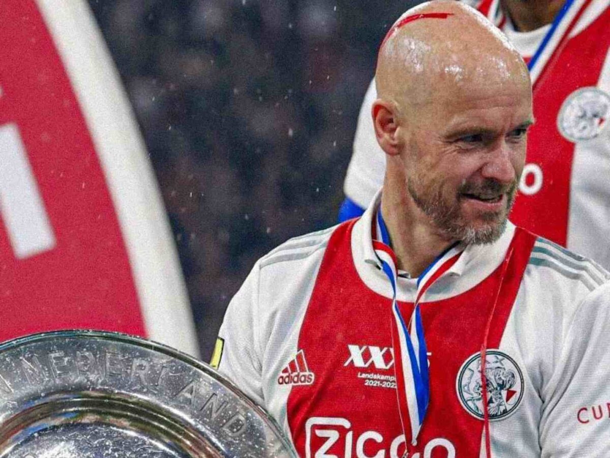 The photo shows Erik ten Hag holding the Eredivisie trophy.