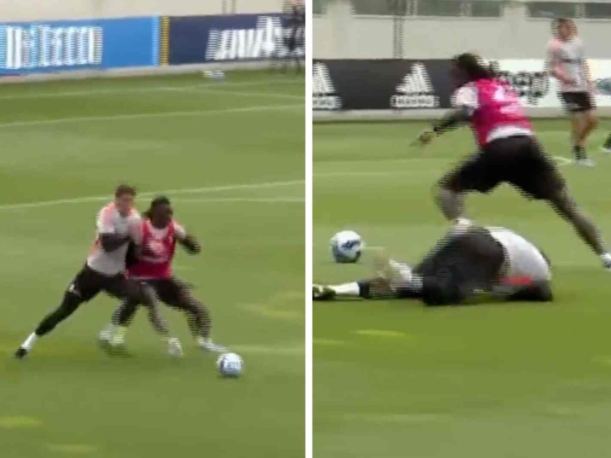 The photo shows Moise Kean putting Dusan Vlahovic on the floor as both Juventus players fight for the ball in training