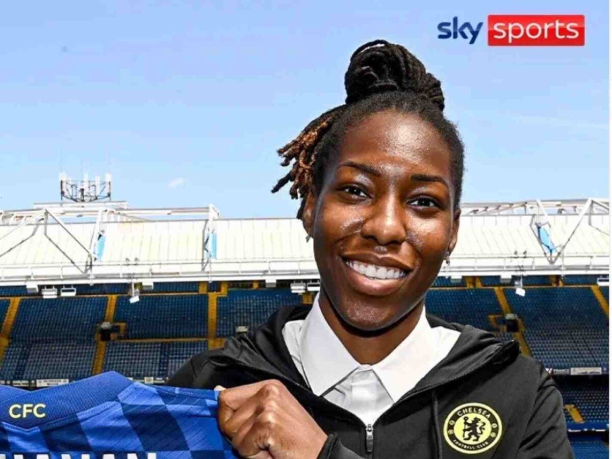 Kadeisha Buchanan holding a Chelsea shirt